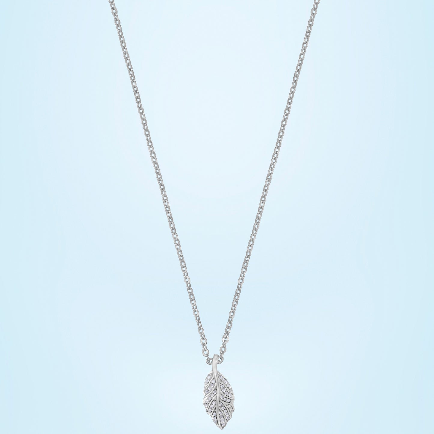 silver necklace with a diamond leaf pendant