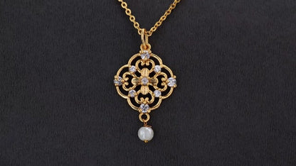 Golden Necklace with a Flower Design on it