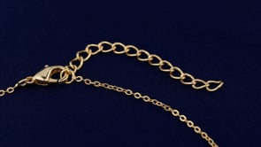 Golden necklace with a diamond pendant