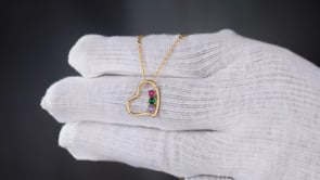 Golden Necklace with a Heart Pendant and a Rainbow Stone