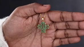 Necklace with a Cactus Charm on it