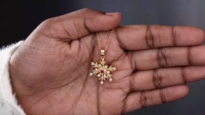 Golden Necklace with a Flower Charm