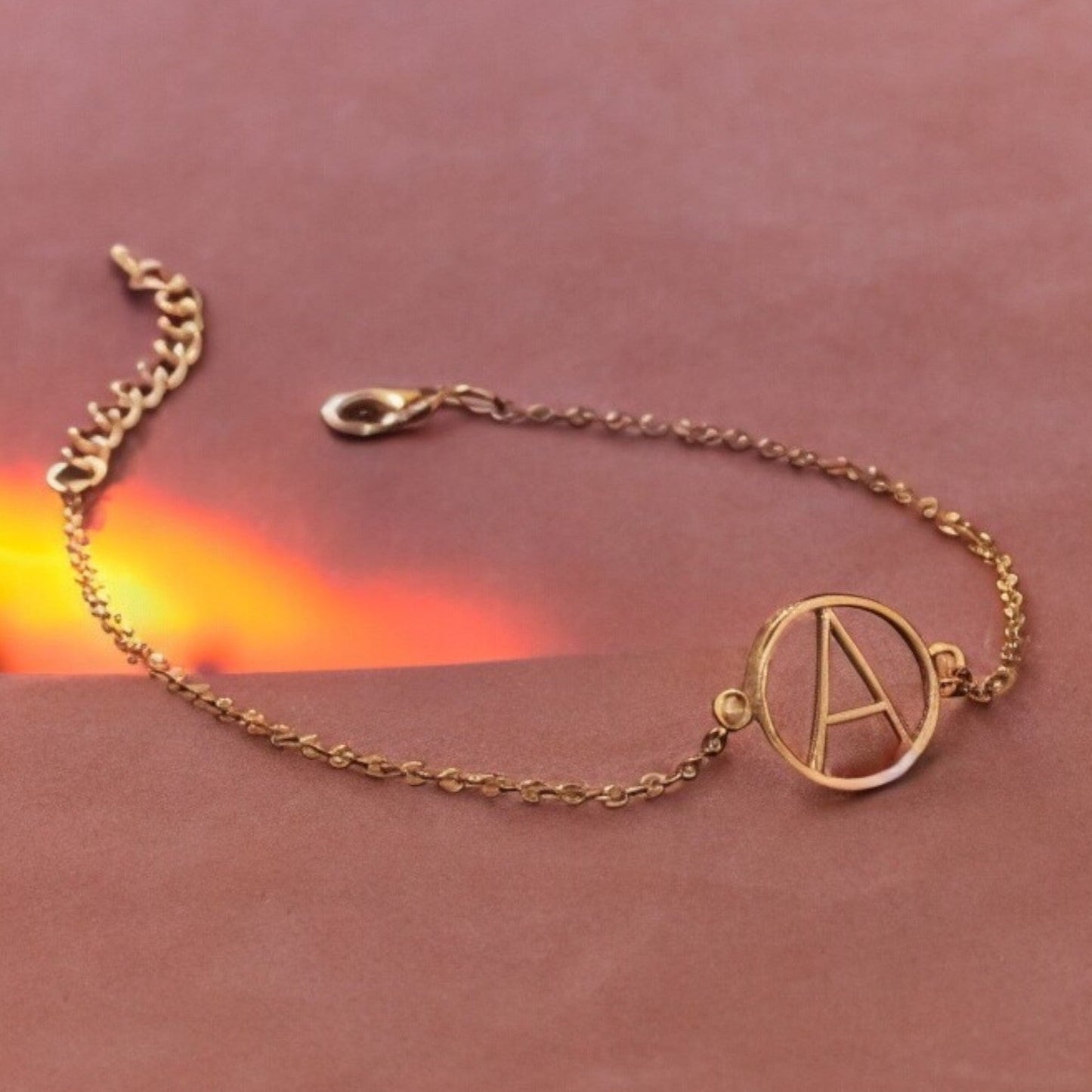 golden bracelet with letter a